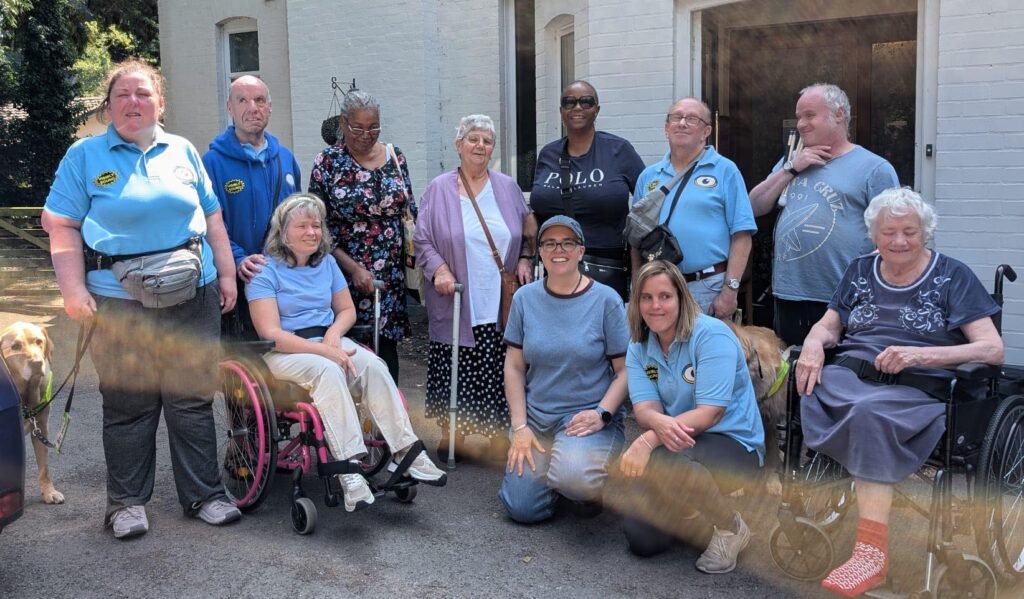 The Music Group poses after a gig at a care home